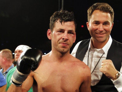 Darren Barker celebrates with Eddie Hearn after winning the IBF world title in New Jersey in 2013