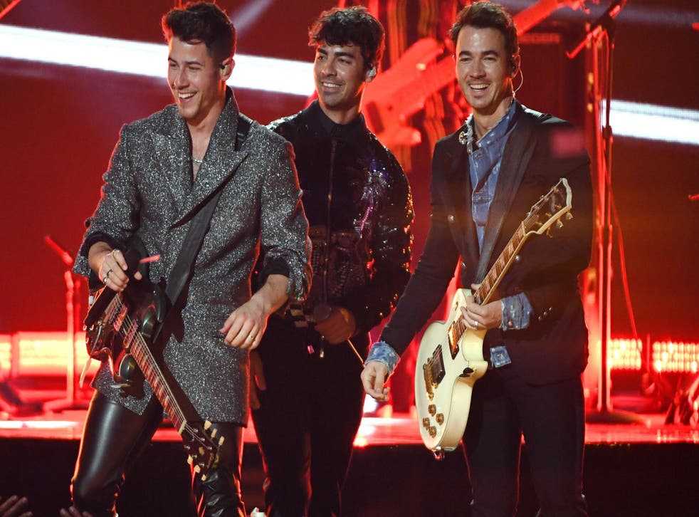 Joe Jonas (centre) claimed to have heard MCR recording while the Jonas Brothers were recording their new album