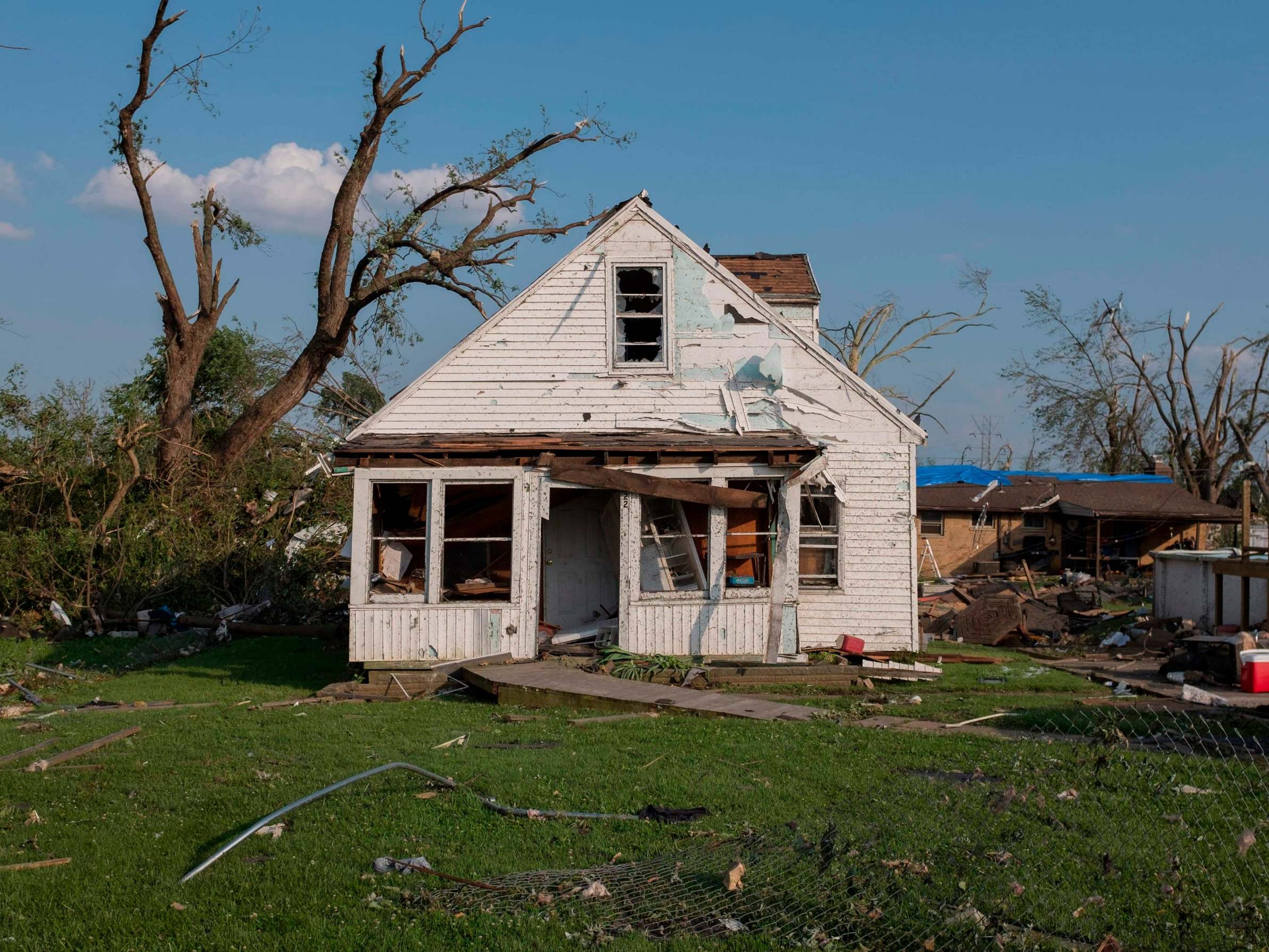 A house damaged by a tornado is seen in Dayton, Ohio on 28 May 2019, after powerful tornadoes ripped through the US state overnight, causing at least one fatality and widespread damage and power outages