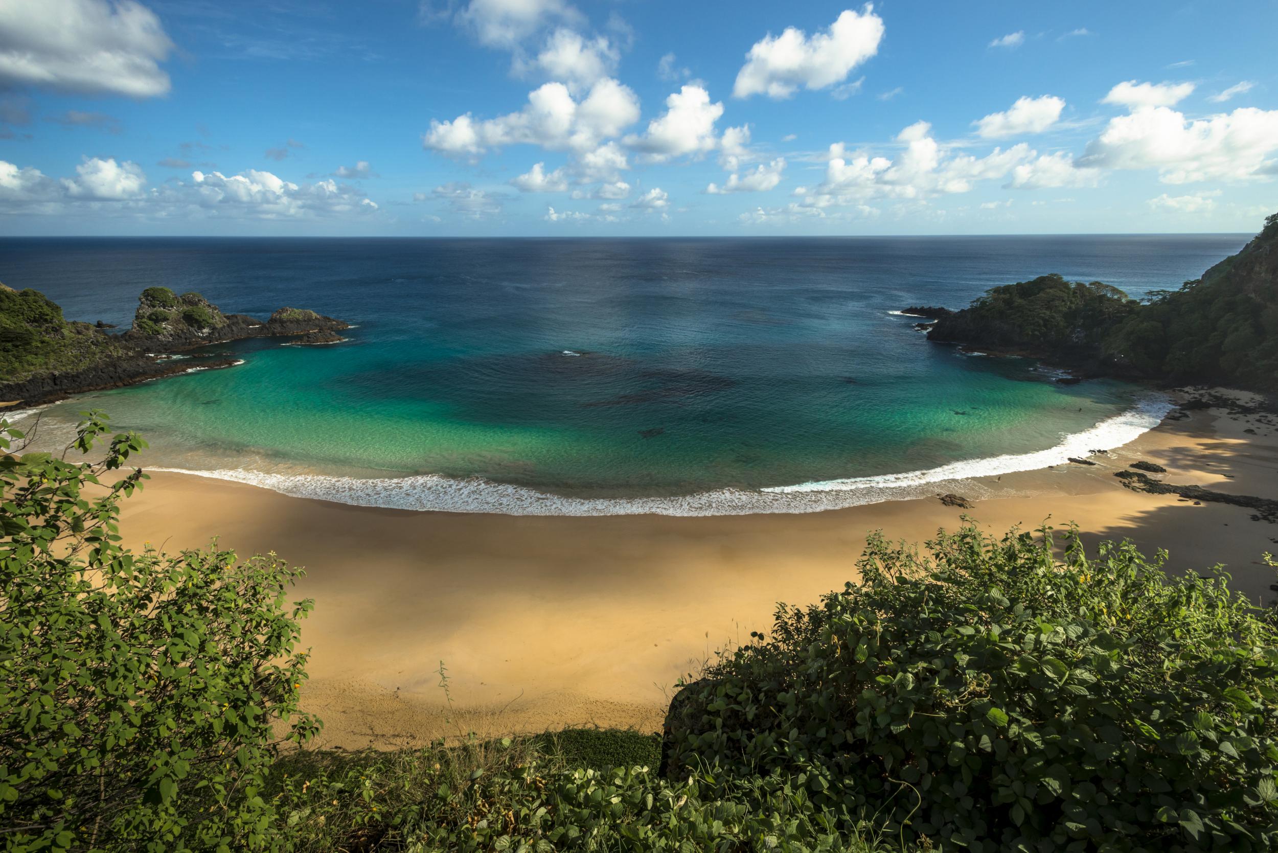 Gaze out at the blue expanse on the world’s best beach, Baia do Sancho in Fernando de Noronha