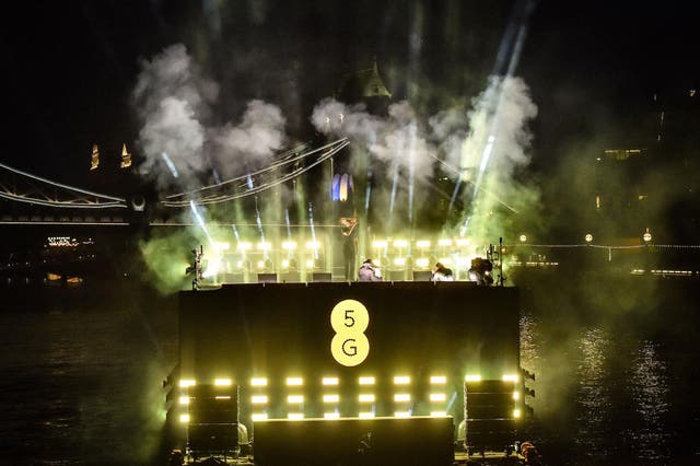 Stormzy performs at a 5G-powered gig beside Tower Bridge on the River Thames to mark the launch of 5G on EE, London