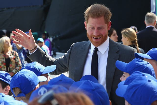 Prince Harry meets children prior to the Group Stage match of the ICC Cricket World Cup 2019 between England v South Africa at The Oval on May 30, 2019 in London, England