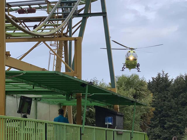 An air ambulance arrives to attend to a boy who fell from a rollercoaster at Lightwater Valley theme park