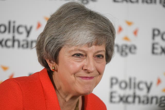 Theresa May recommending a reduction in tuition fees