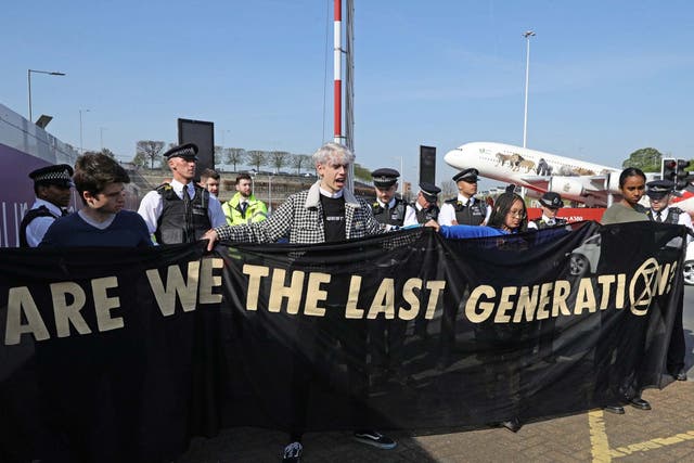 File photo dated 19/04/19 of Extinction Rebellion (XR) demonstrators at London Heathrow airport