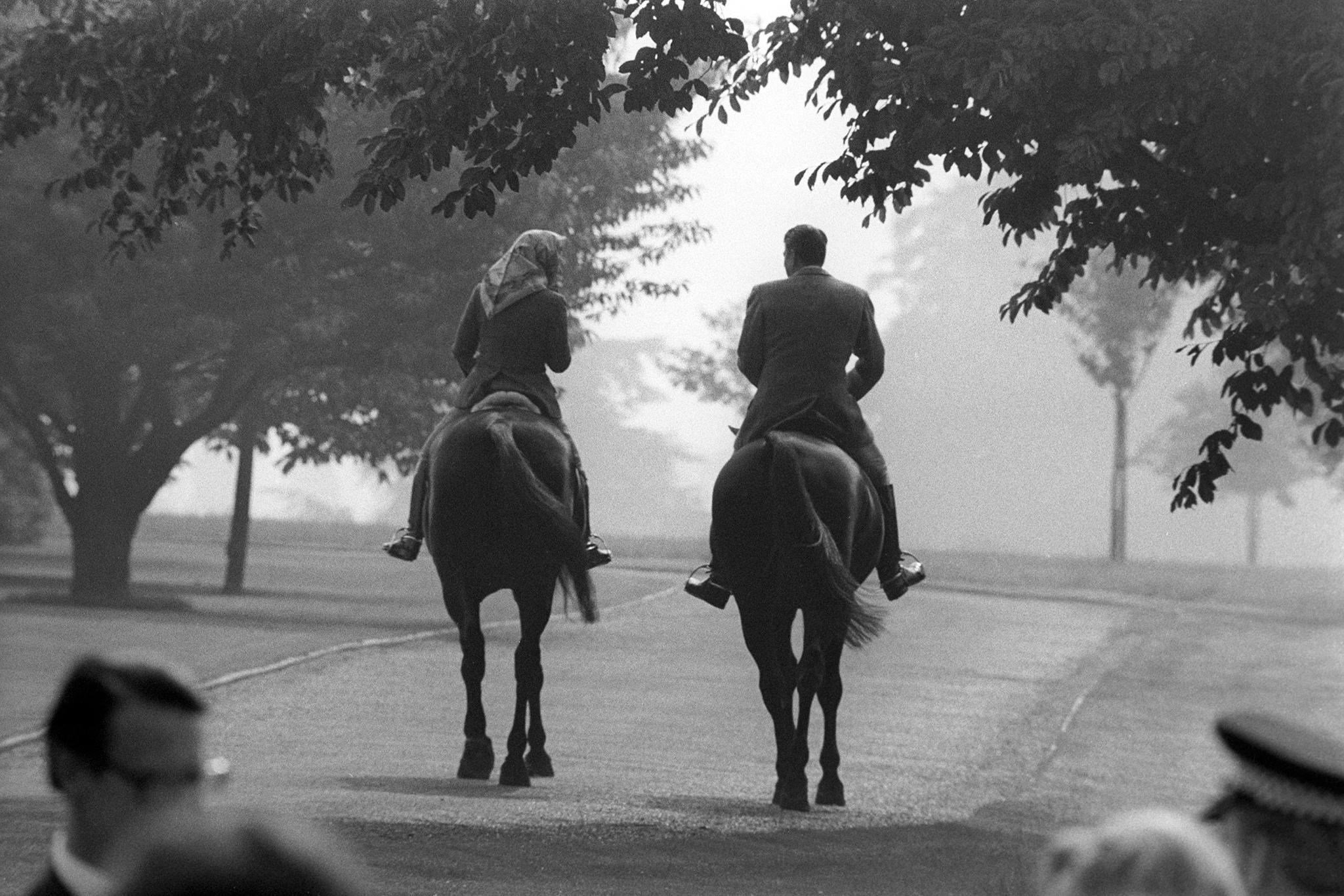 Queen Elizabeth and President Reagan out riding in Windsor Home Park in June 1982