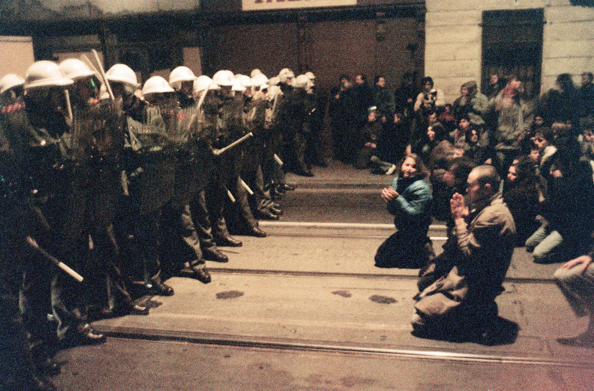 Czechoslovakian students face riot police in November 1989 in Prague