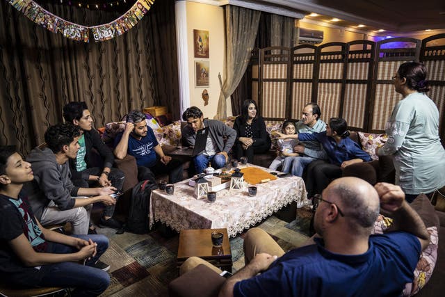 The Diab family and their friends in Gaza gather during Iftar to Skype America