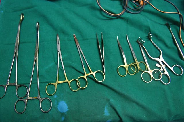 A man has been accused of tricking his daughters into getting FGM