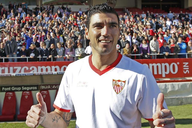 Reyes in Sevilla colours in January 2012: he first joined the club as a precocious 10-year-old