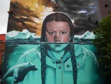Mural of Greta Thunberg submerged in glacial water painted in Bristol