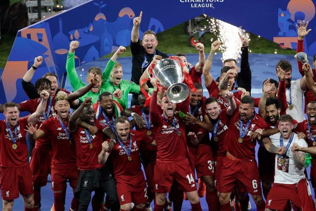 Jordan Henderson lifts the Champions League trophy after Liverpool's 2-0 victory over Tottenham