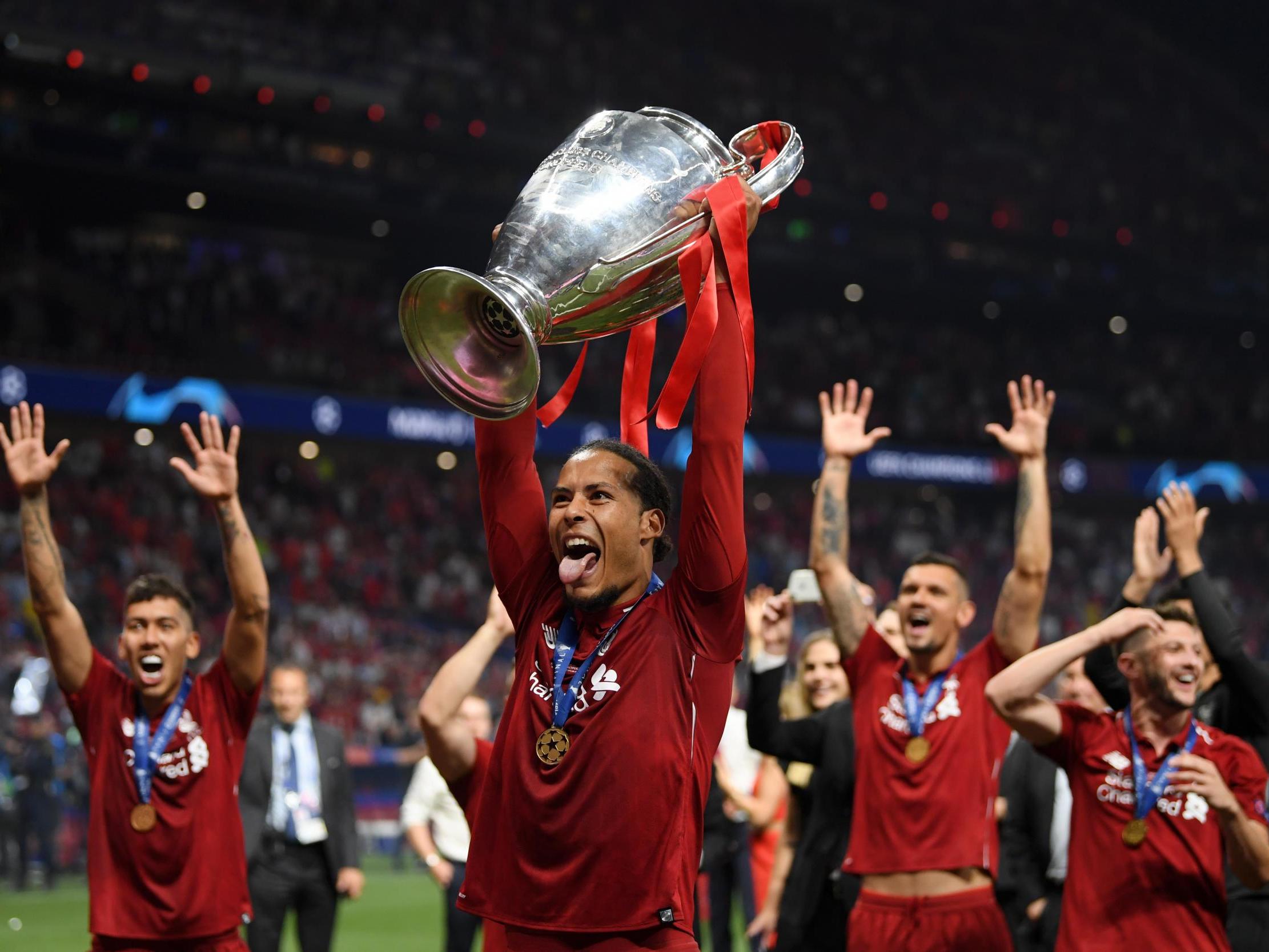 Virgil van Dijk lifts the Champions League trophy