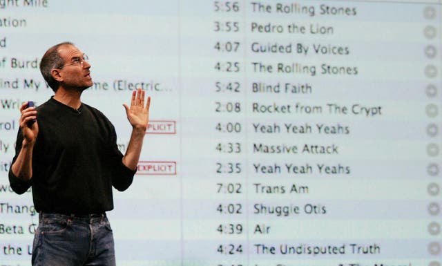 Apple CEO Steve Jobs gestures as he announces Apple 'iTunes' Music Store in the UK, France and Germany 15 June, 2004 at a press release party in London