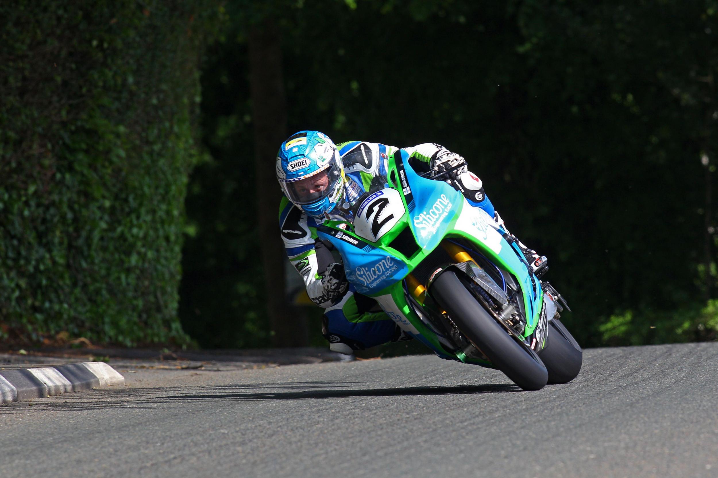 Harrison led the RST Superbike race until the end of the second lap