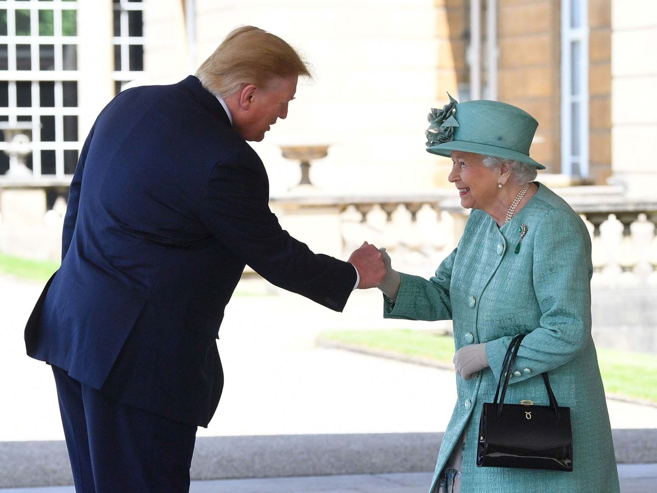 Trump state visit President gives Queen bizarre fist bump handshake at Buckingham Palace The Independent The Independent