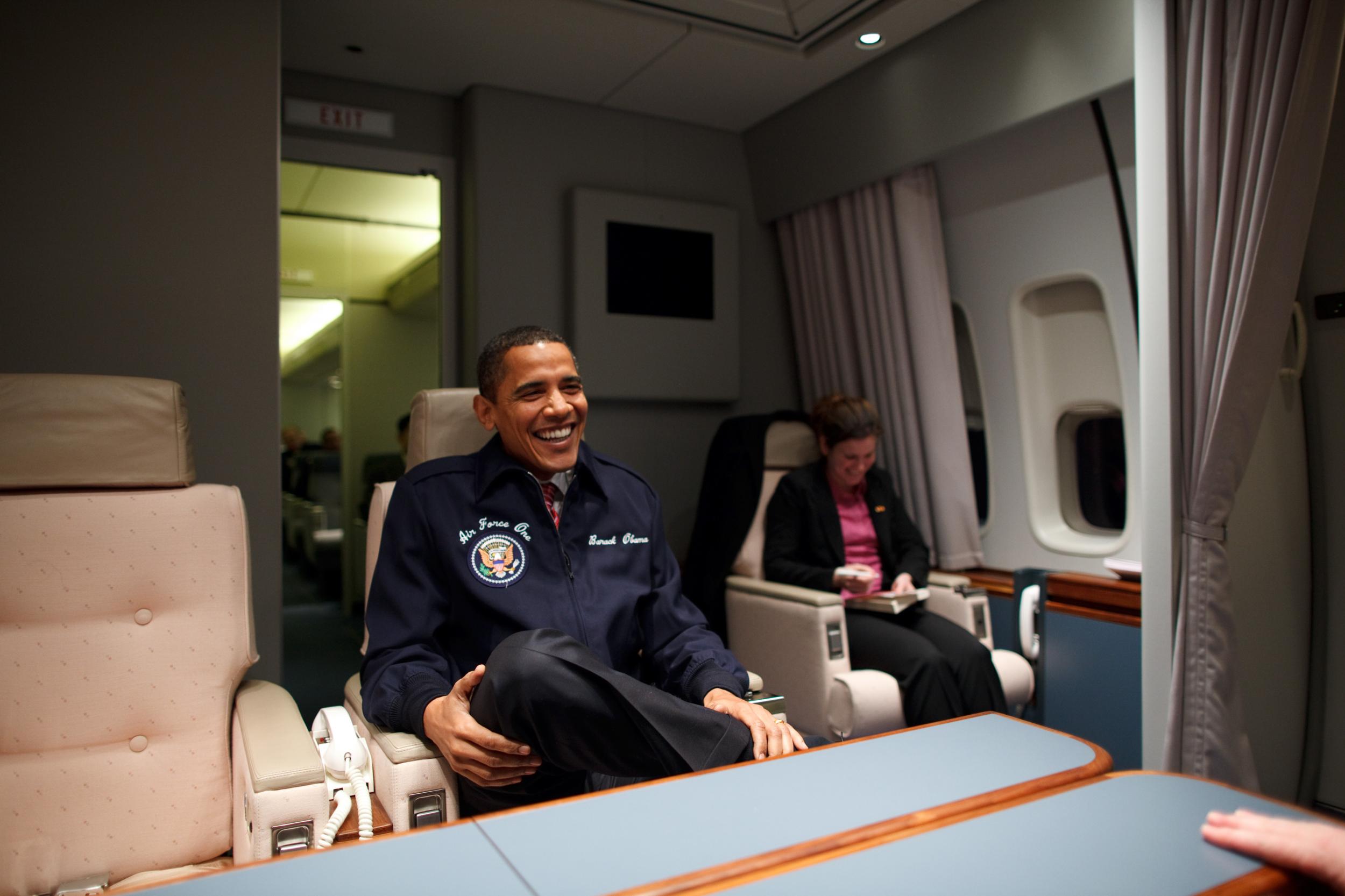 Barack Obama wearing his personalised jacket on board Air Force One.