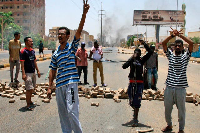 Protesters chant slogans outside Khartoum’s army headquarters