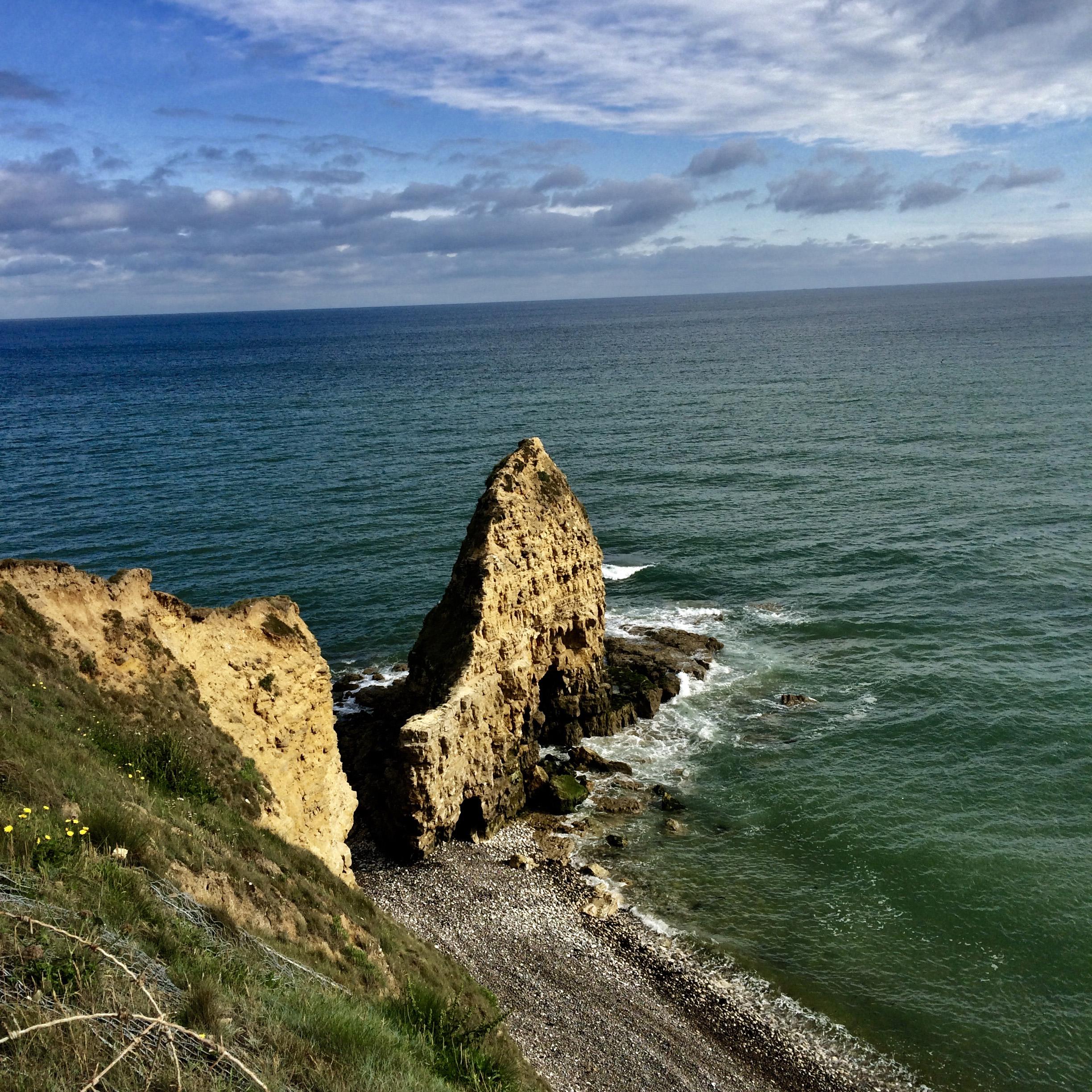 Point du Hoc is on the Normandy Coast, overlooking the English Channel. US army rangers landed on the beach below on D-Day and scaled the cliffs using ropes and ladders