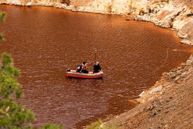 Investigators search for victims of a suspected serial killer in the Red Lake out of the village of Mitsero