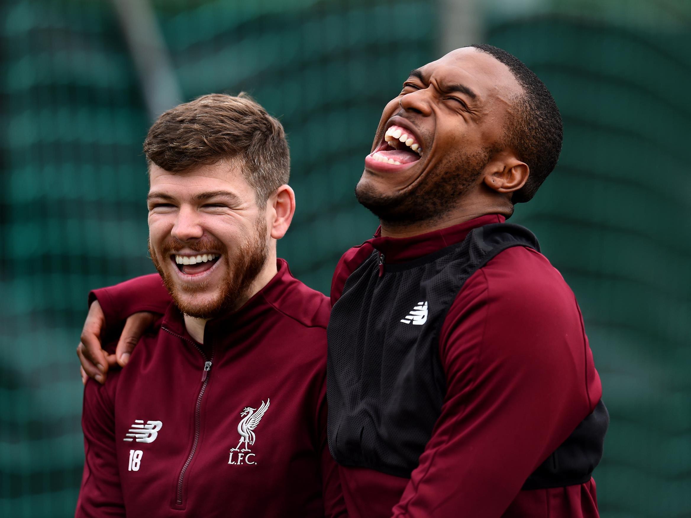 Alberto Moreno and Daniel Sturridge of Liverpool during a training session