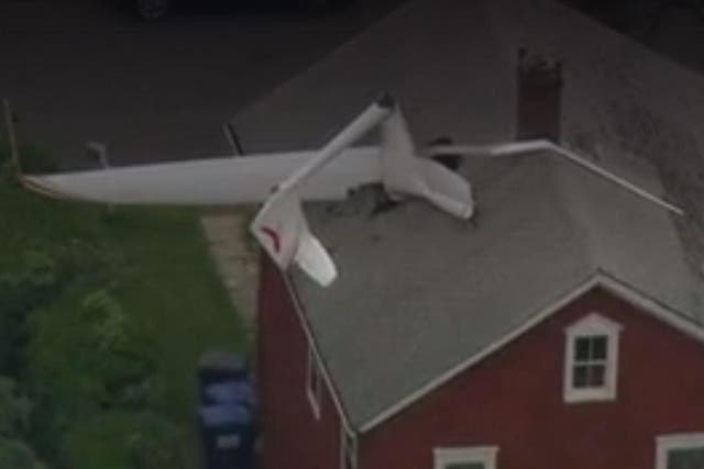 The plane pierced through the roof into the attic of the house in Danbury