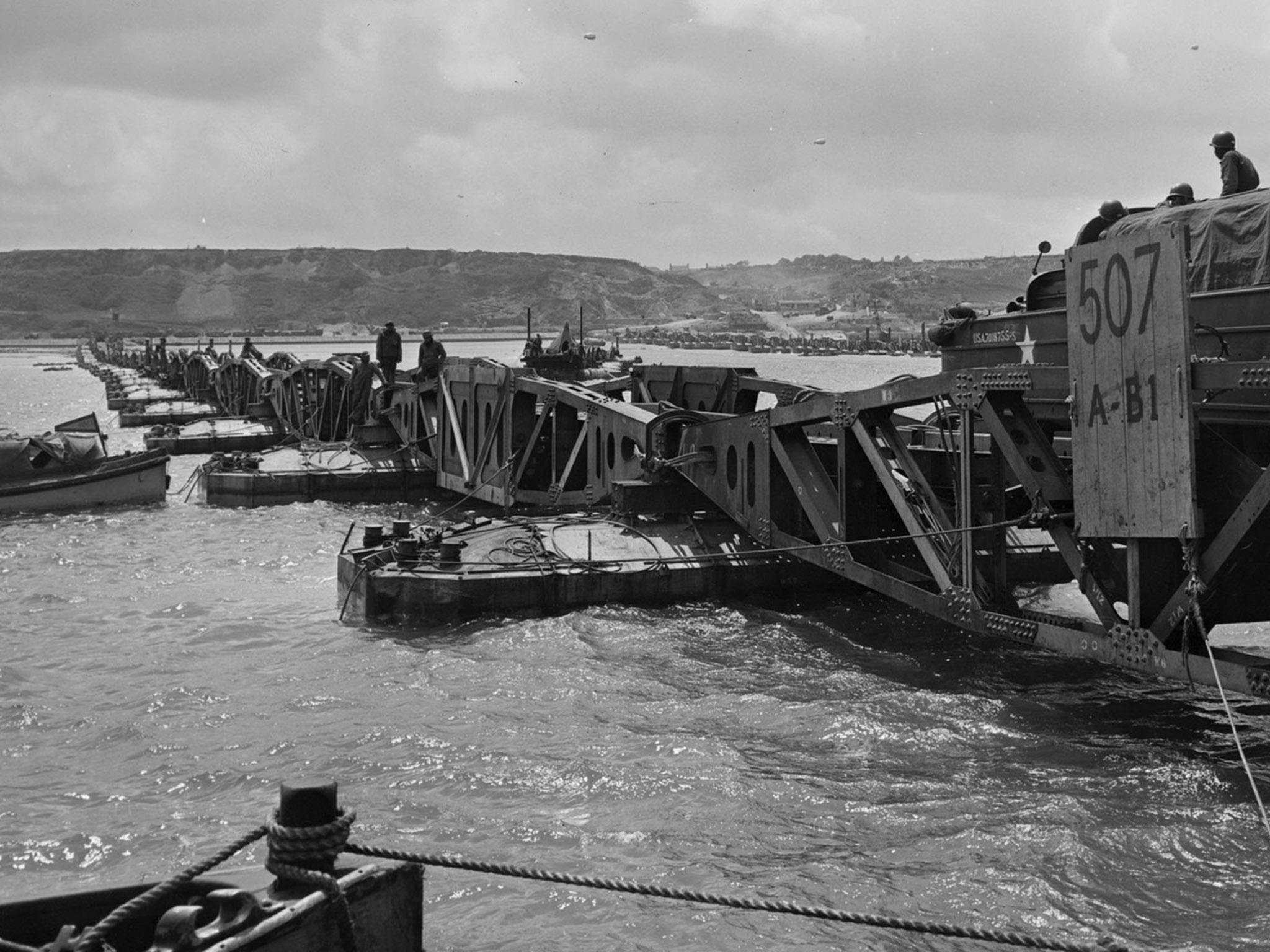 The secret floating harbour on Omaha beach in Normandy being used to send large trucks over