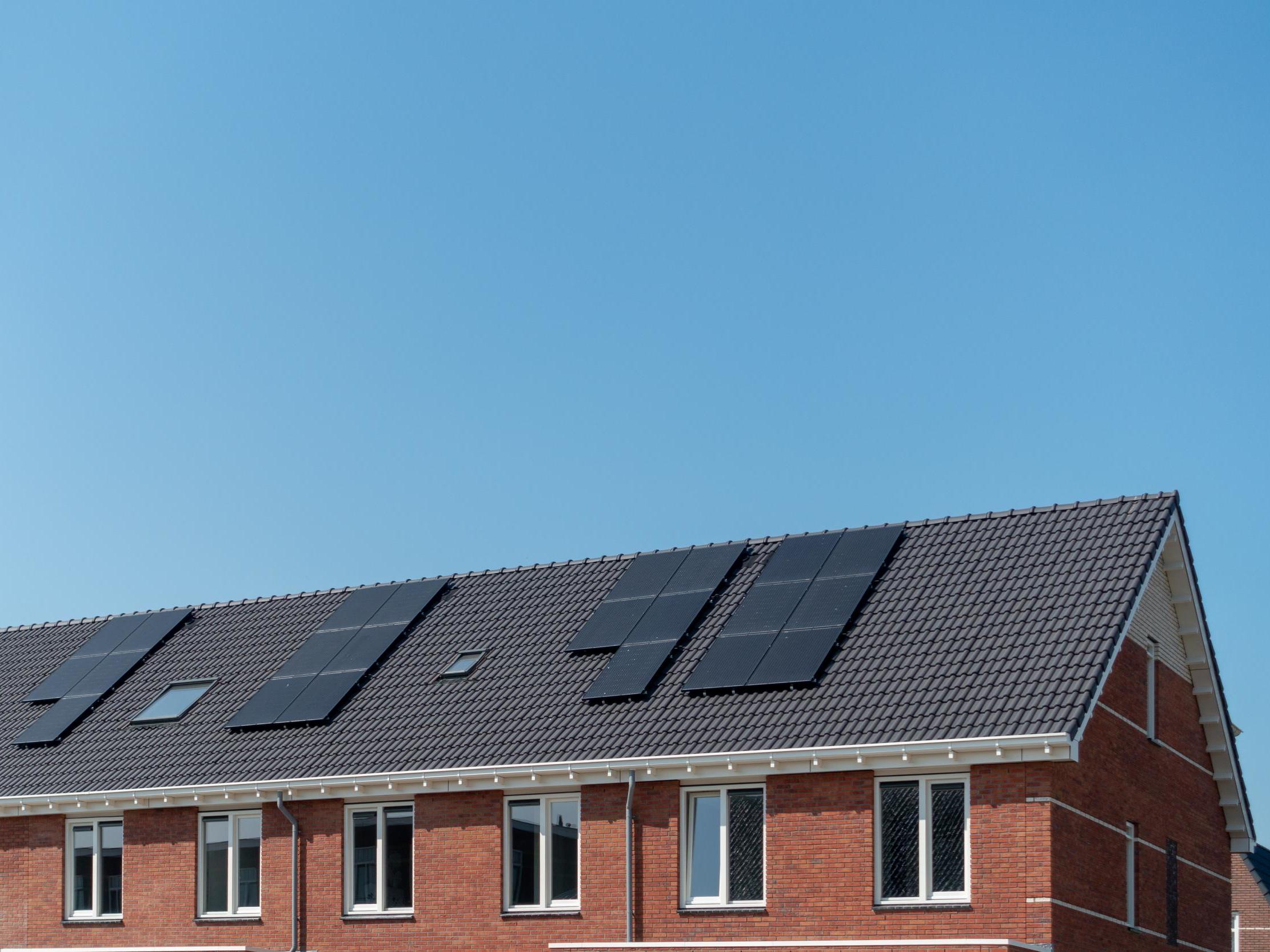 File image of solar panels on house roof.
