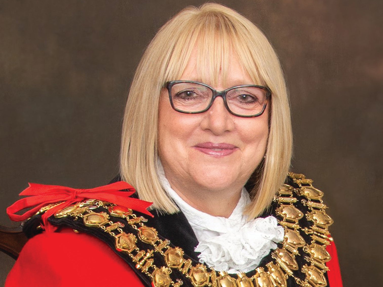 Laura Booth, the mayor of Stockport, faced abuse online over her footwear