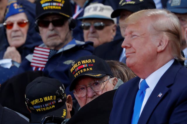 President Donald Trump with US D-Day veterans at commemoration of its 75th anniversary in Normandy, France
