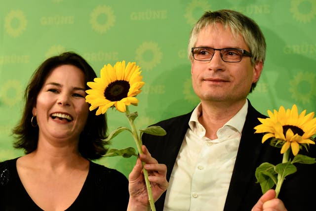 Annalena Baerbock, co-leader of the Greens, with party MEP Sven Giegold
