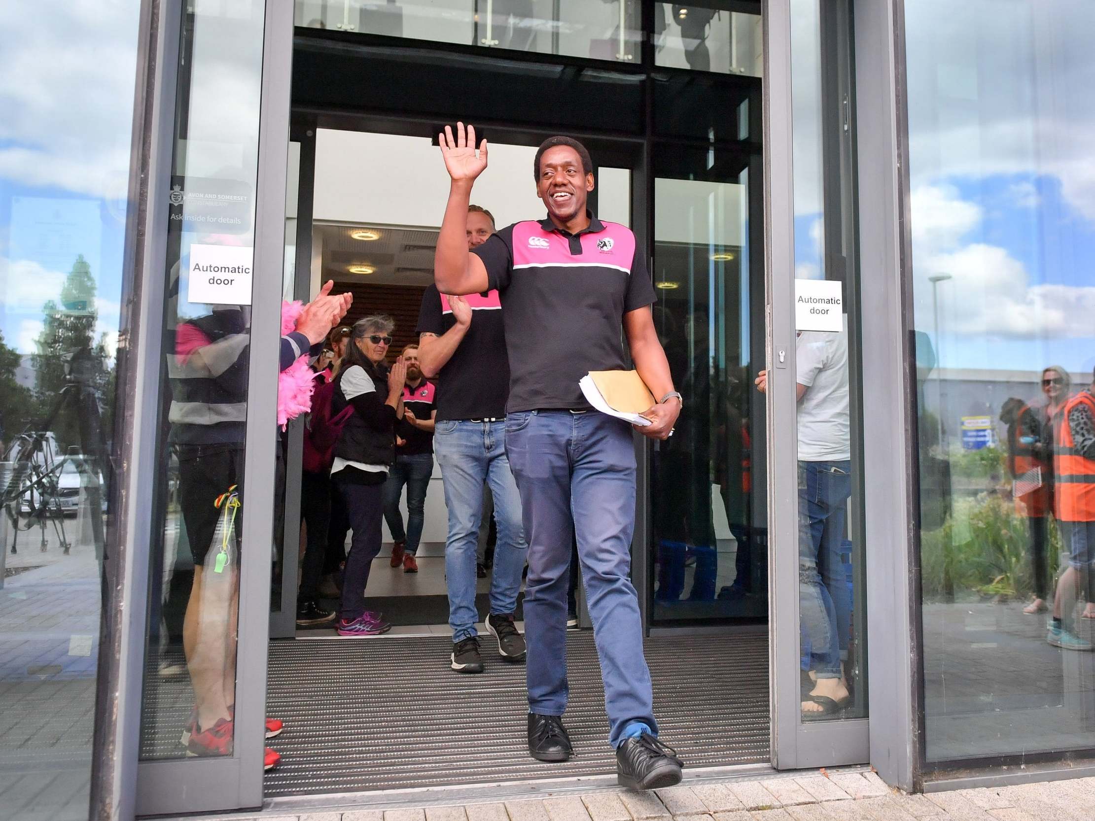 Gay rugby player Ken Macharia leaves Bridgewater police station after reporting to officials