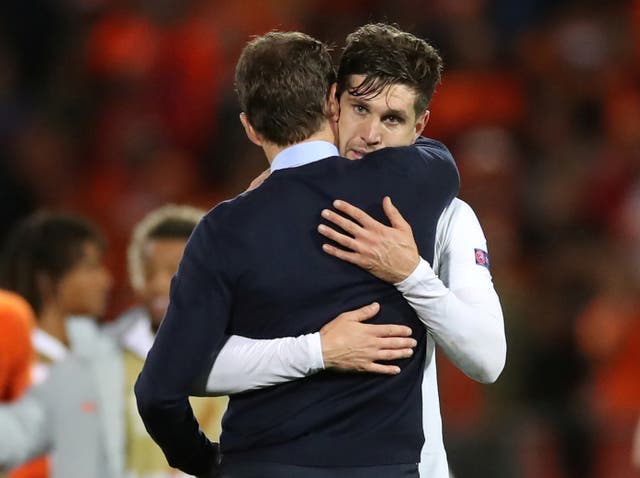 Gareth Southgate consoles John Stones after the full-time whistle