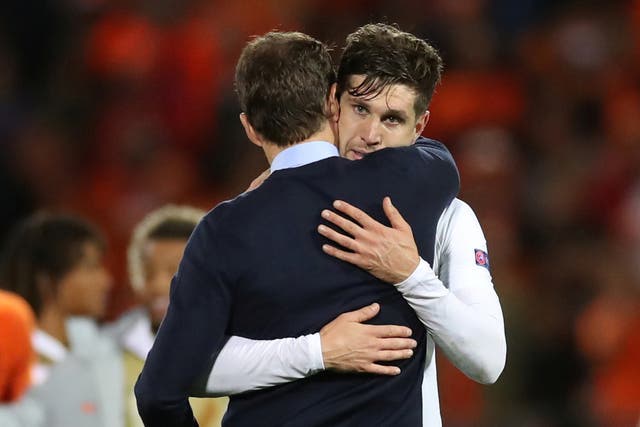 Gareth Southgate consoles John Stones after the full-time whistle