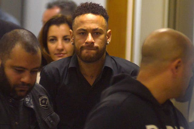 Neymar leave the police station in Rio de Janeiro
