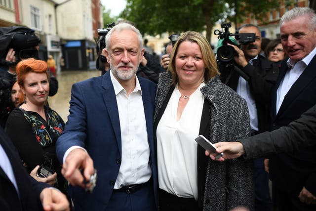 Jeremy Corbyn celebrates with new Labour MP Lisa Forbes in Peterborough 