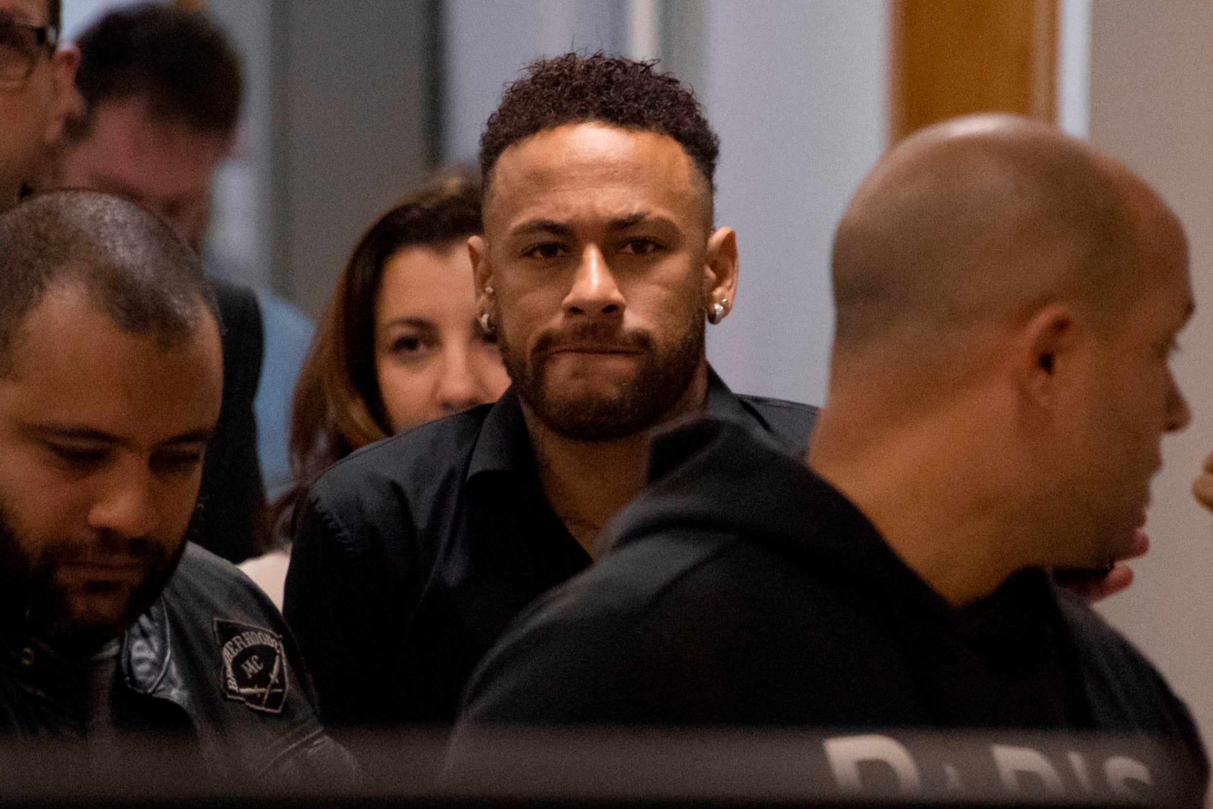 Neymar enters police station in Brazil to make a statement (AFP/Getty)