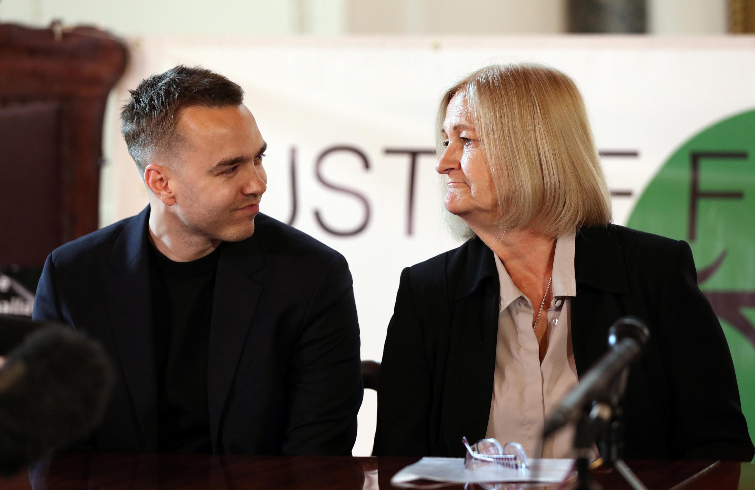 Sally Challen, flanked by her son David, during a press conference yesterday after she left the Old Bailey