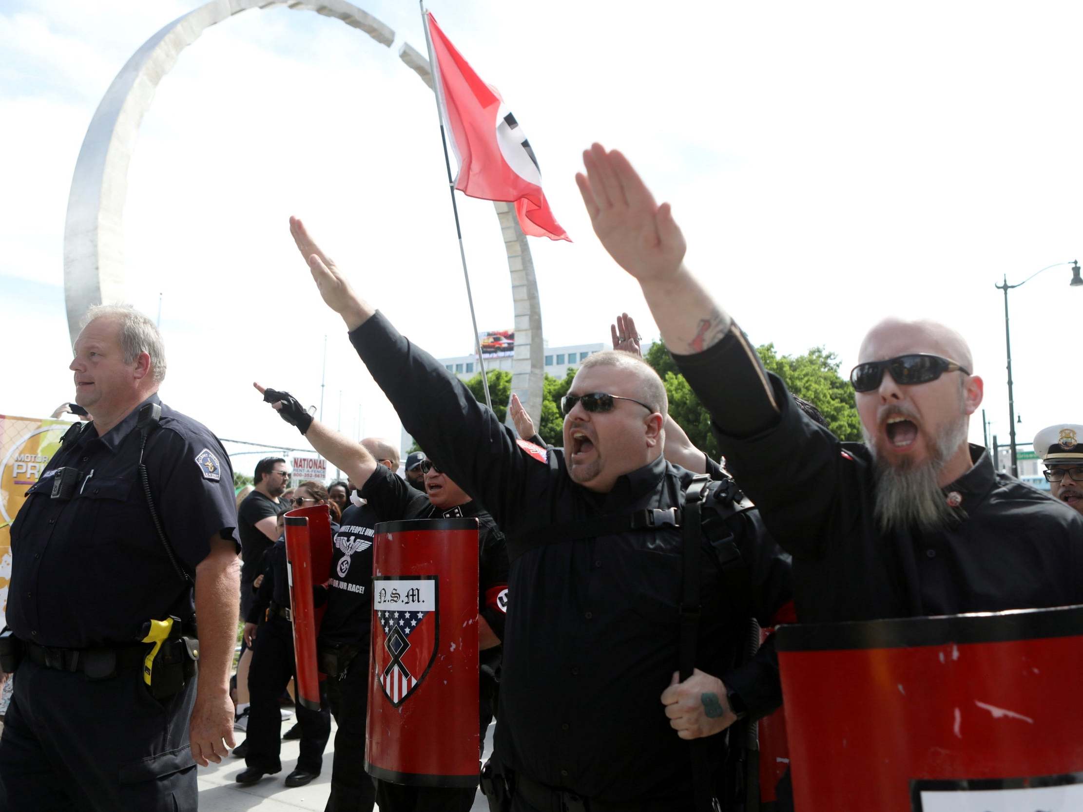 National Socialist Movement members demonstrate against the LGBT event Motor City Pride