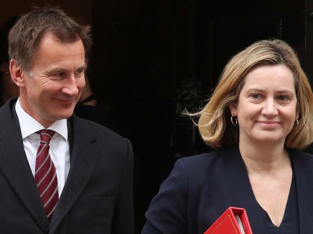 Cabinet colleagues Jeremy Hunt and Amber Rudd leave a cabinet meeting at 10 Downing Street