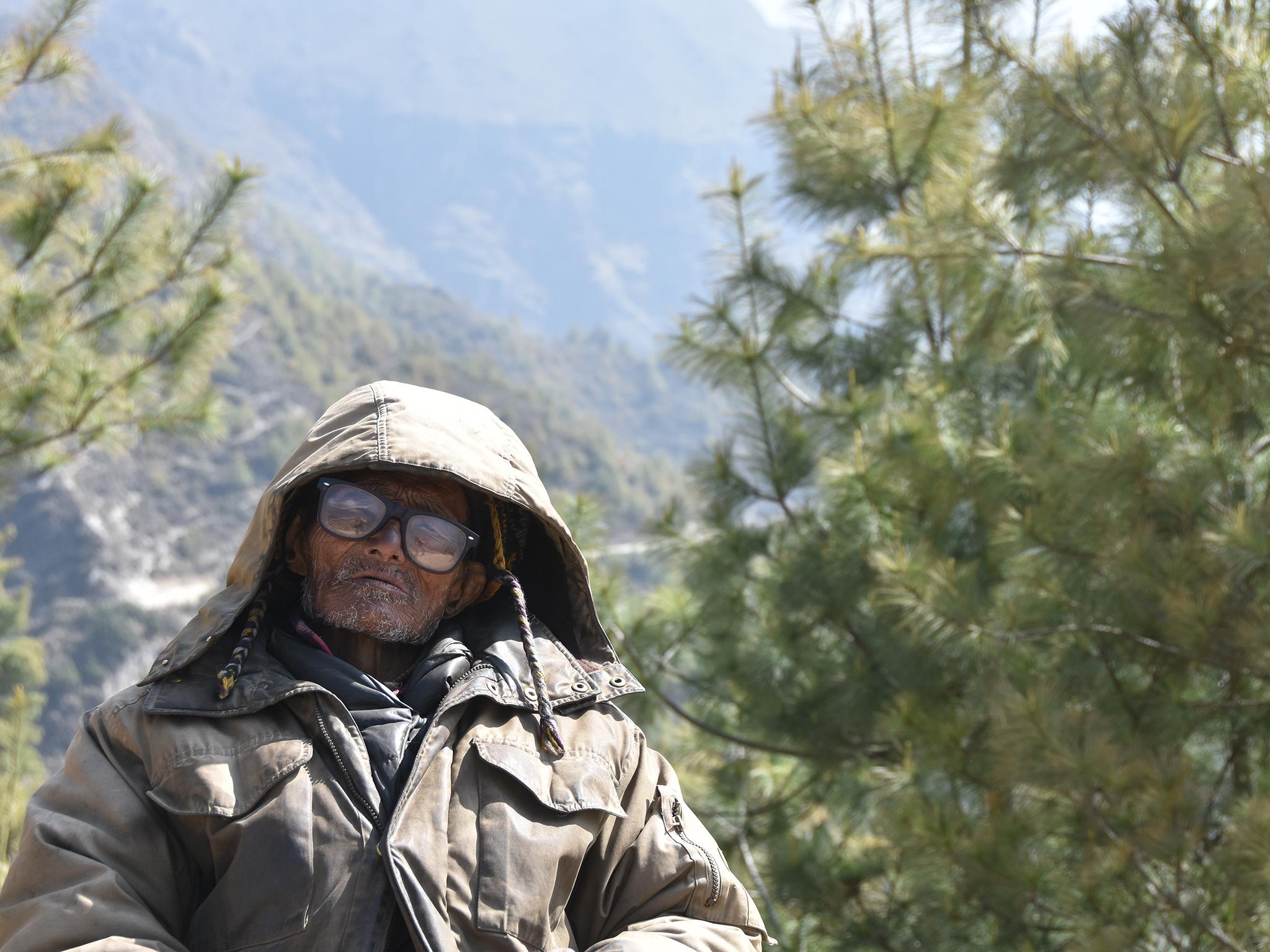 One of the Sherpas who collects money for clearing the trail
