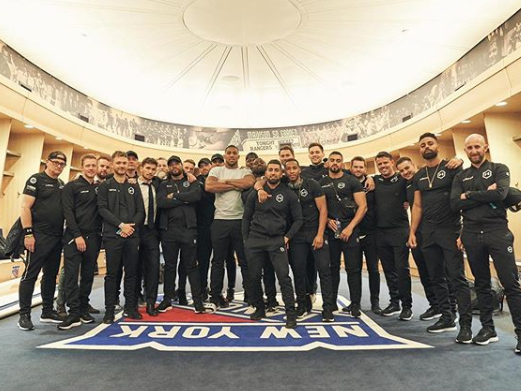 Anthony Joshua with his extensive team