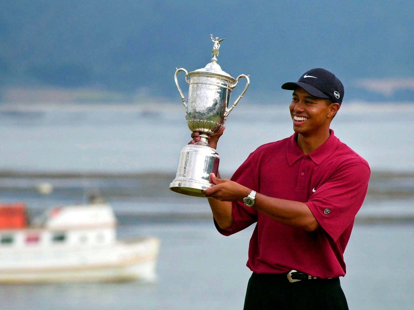 Tiger Woods celebrates winning the US Open at Pebble Beach in 2000