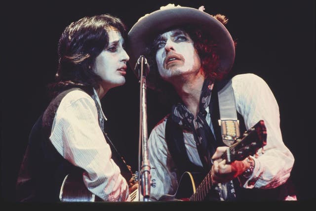 Bob Dylan and Joan Baez duet during the Rolling Thunder Revue tour