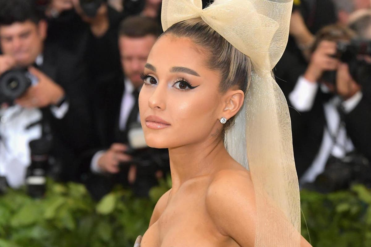 Ariana Grande shows off revolving door of sultry looks as she