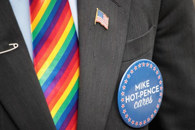 Mike Pence (represented above by look-alike Mike-Hot-Pence) has defended US government's decision to bar rainbow flags outside US embassies