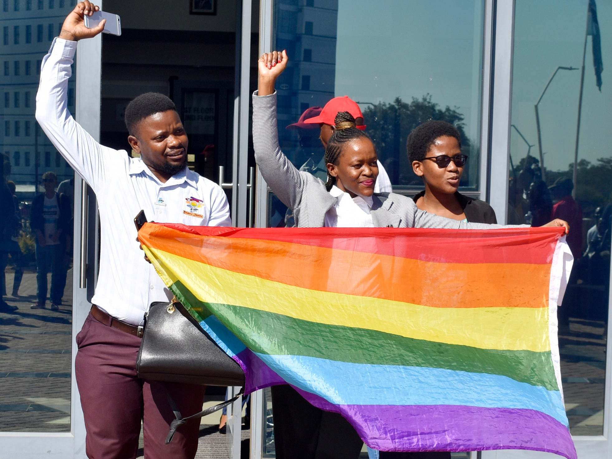 &#13;
Activists celebrate outside the High Court in Botswana &#13;