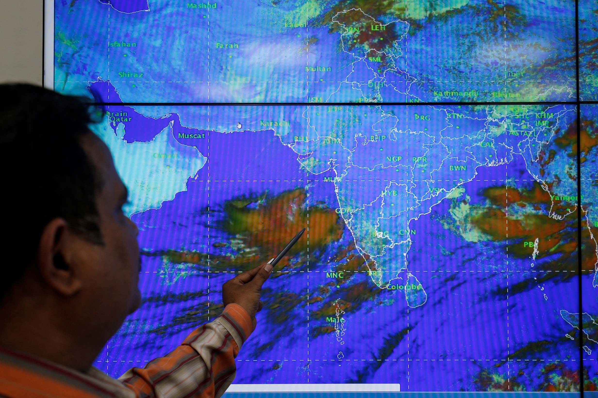 An India Meteorological Department scientist monitors Cyclone Vayu inside his office in Ahmedabad (Reuters)