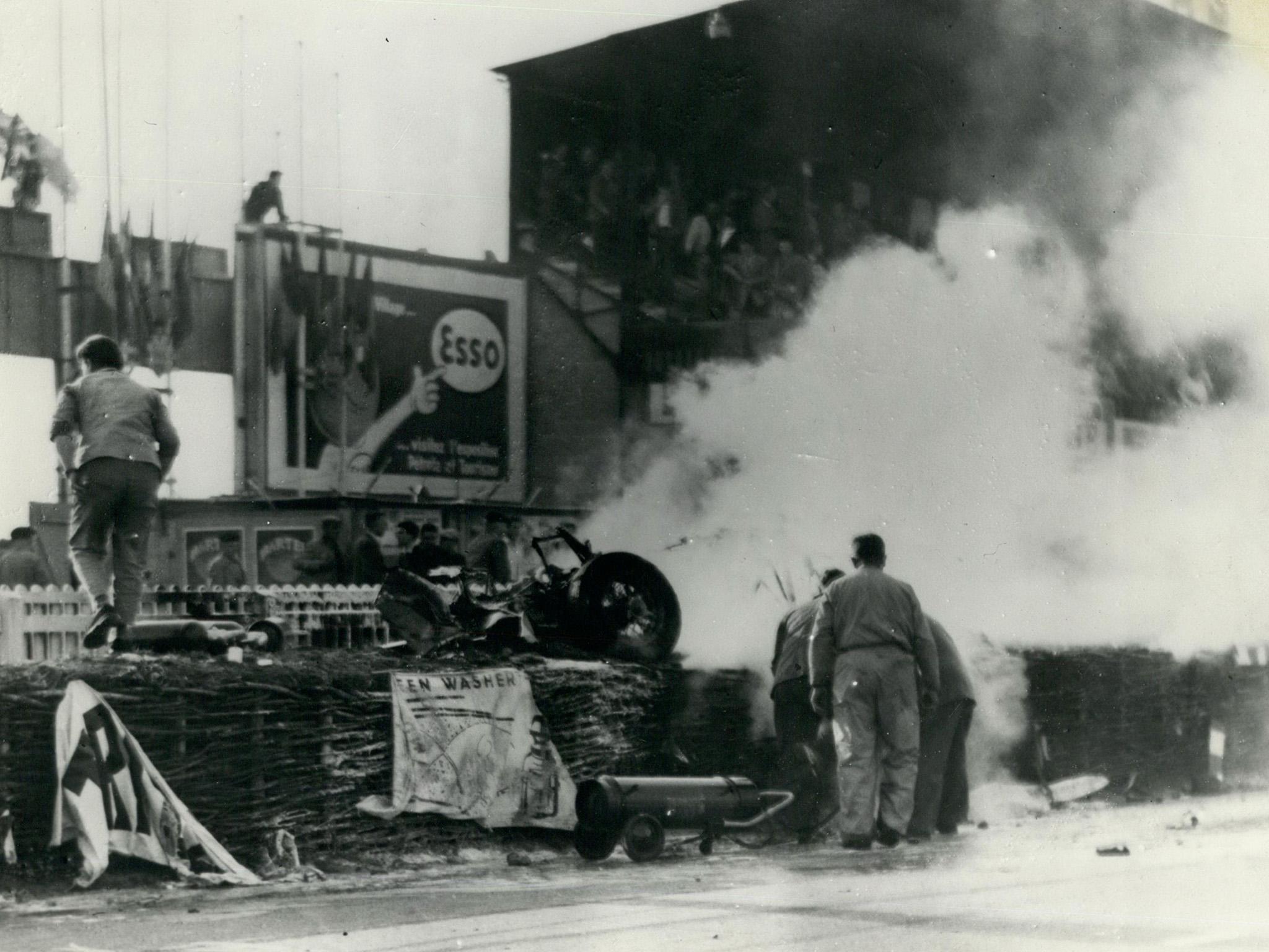 1955: the blazing wreckage of the Mercedes car, driven by French driver Pierre Levegh