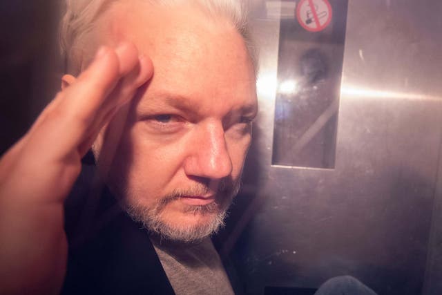 Julian Assange in a prison van leaving Southwark Crown Court on 1 May 2019